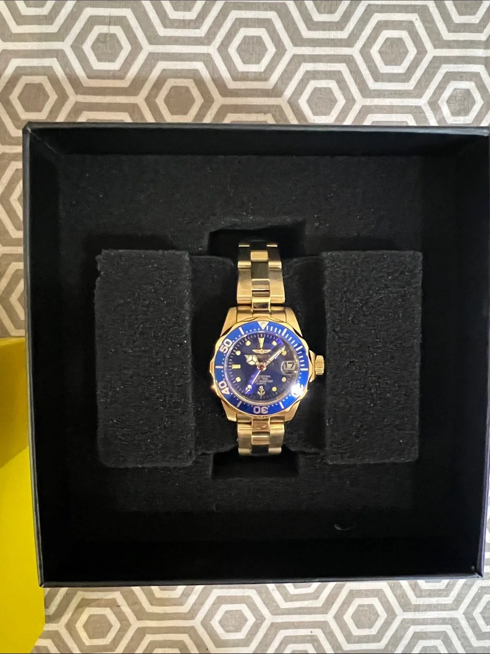 Invicta Gold Tone Watch with Blue Dial and Bezel